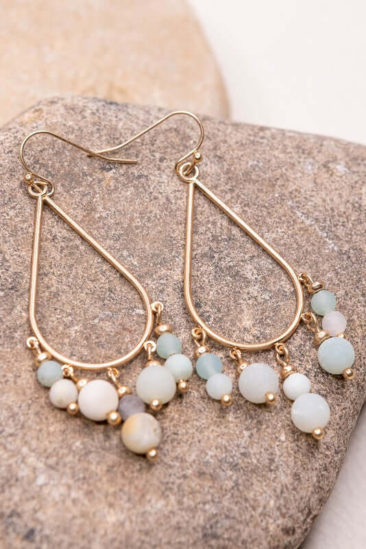 Gold fishhook teardrop hoop earrings with natural stone dangles. Light weight
