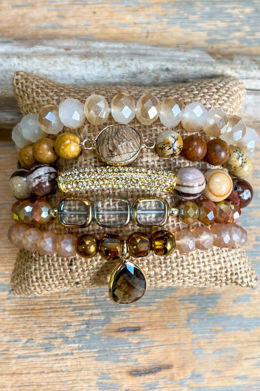 Set of bracelets including 6 beaded stretch bracelets that each have their own unique features Stretch Bracelet Diameter: 3"