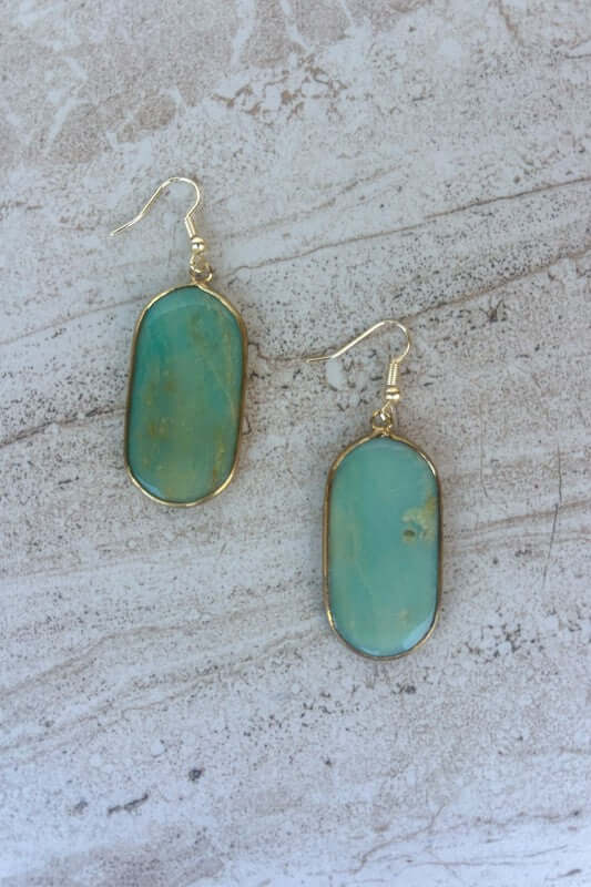 Fishhook oval stone earrings. Color/texture may vary due to use of natural material.