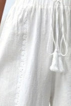 White pants with drawstring waistband on a white background