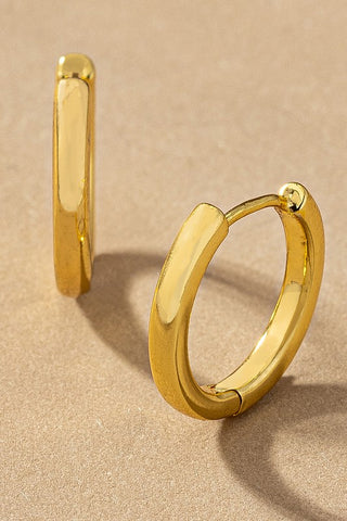 Skinny Brass Huggie Hoop Earrings in Gold