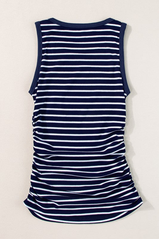 Navy and white striped dress on a light gray background