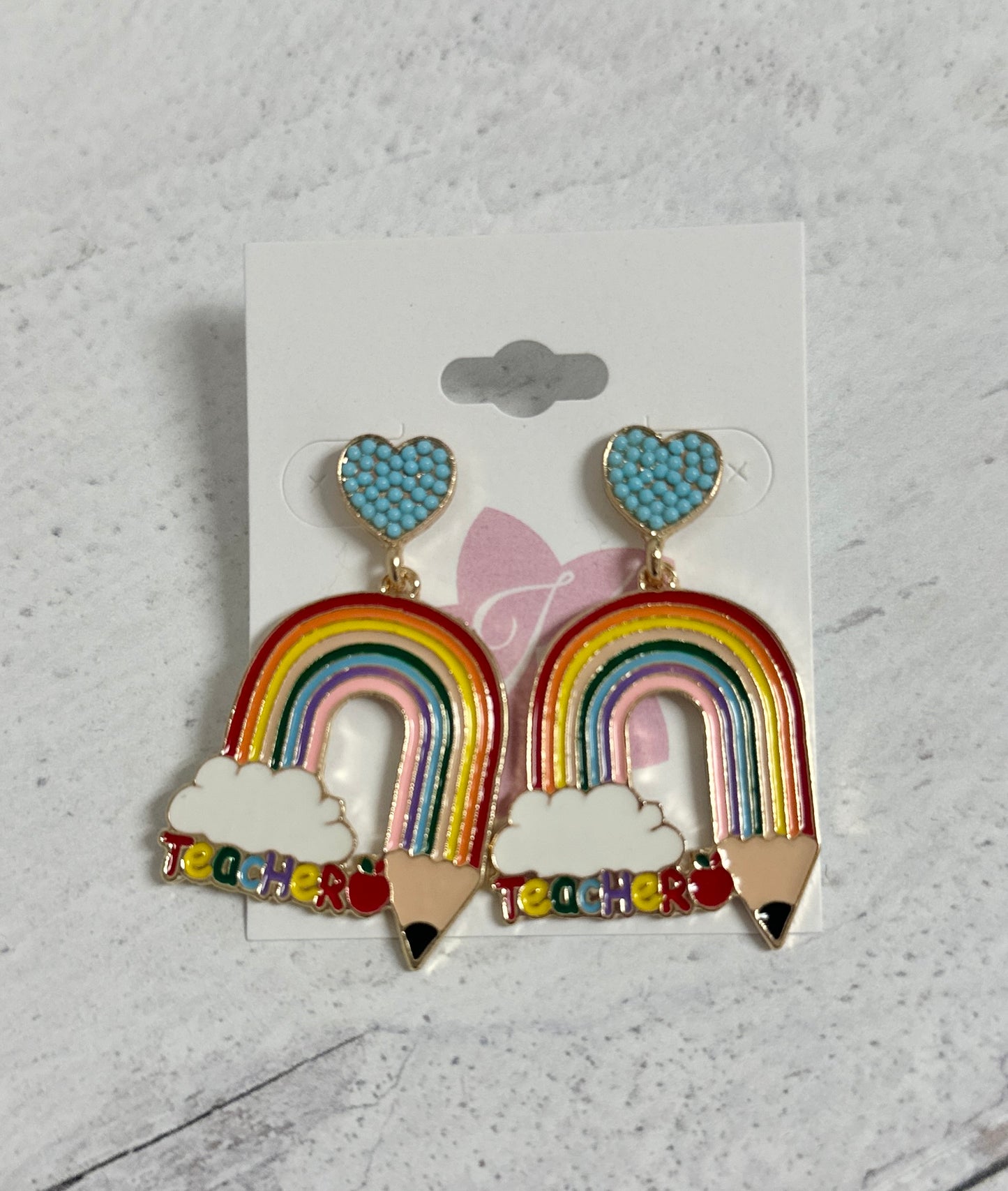 Bright and cheerful rainbow-shaped earrings, designed to celebrate creativity and positivity. Lightweight and colorful, perfect for teachers or anyone who loves playful, statement accessories.